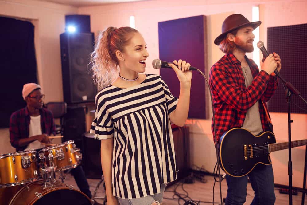 Artists performing at a studio rehearsal